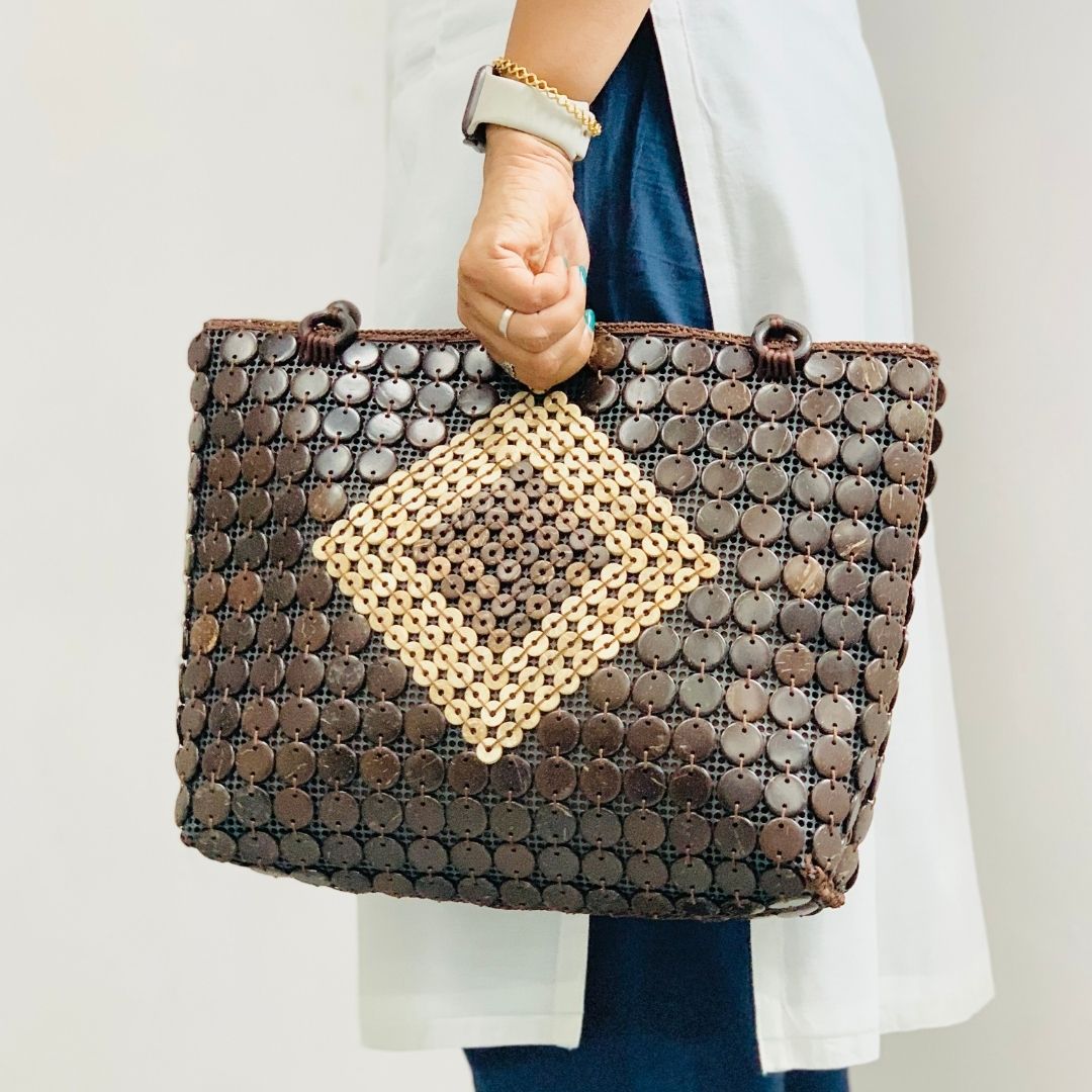 Model holding DaisyLife Coconut natural bags for office and daily use