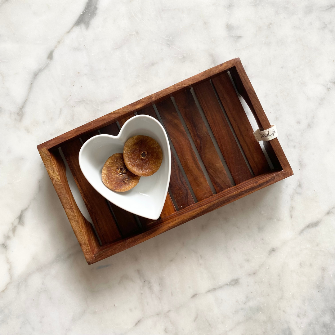 Dry fruits kept on beautiful wooden tray