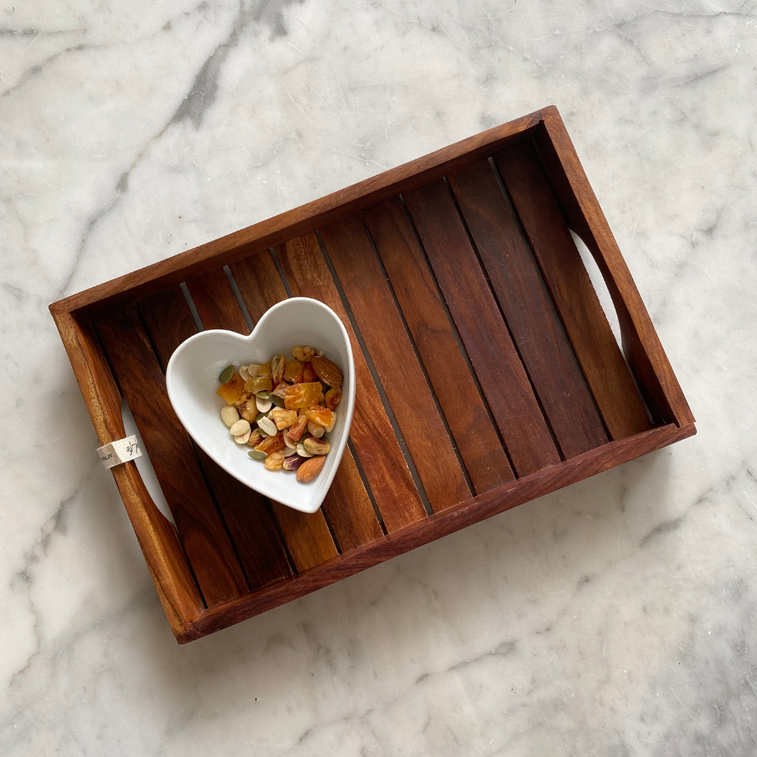 Dry fruits kept on beautiful wooden tray