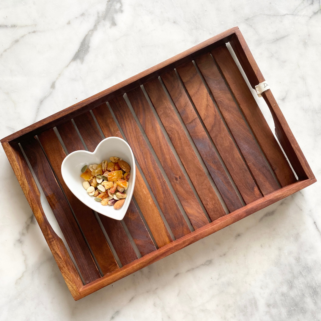 Dry fruits kept on beautiful wooden tray