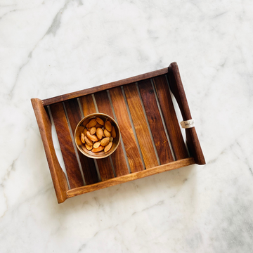 Almonds kept on wooden tray