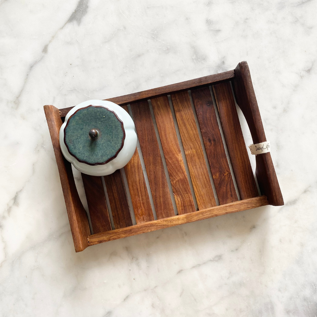 spice box kept on antique wooden tray