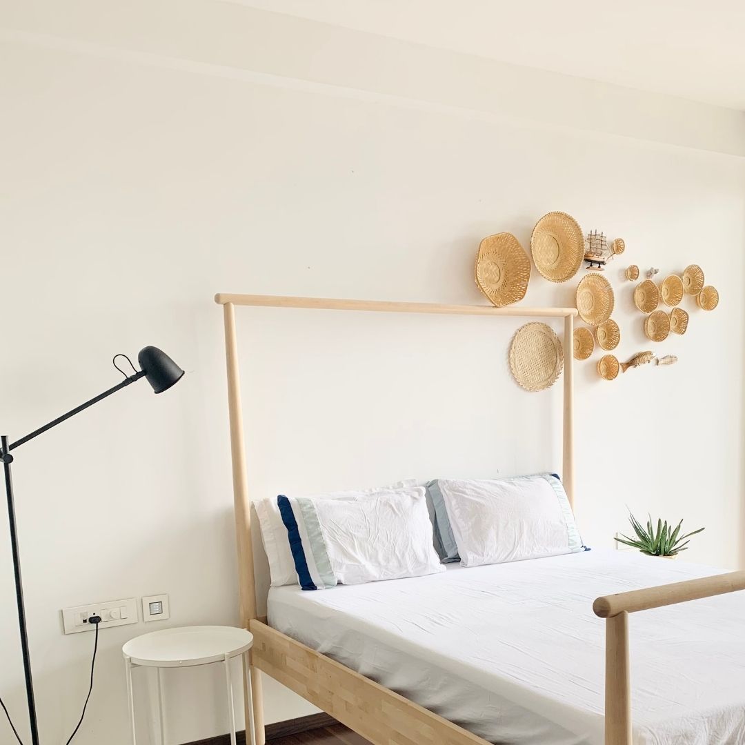 Sea wall decor arrangement in bedroom set up, side view