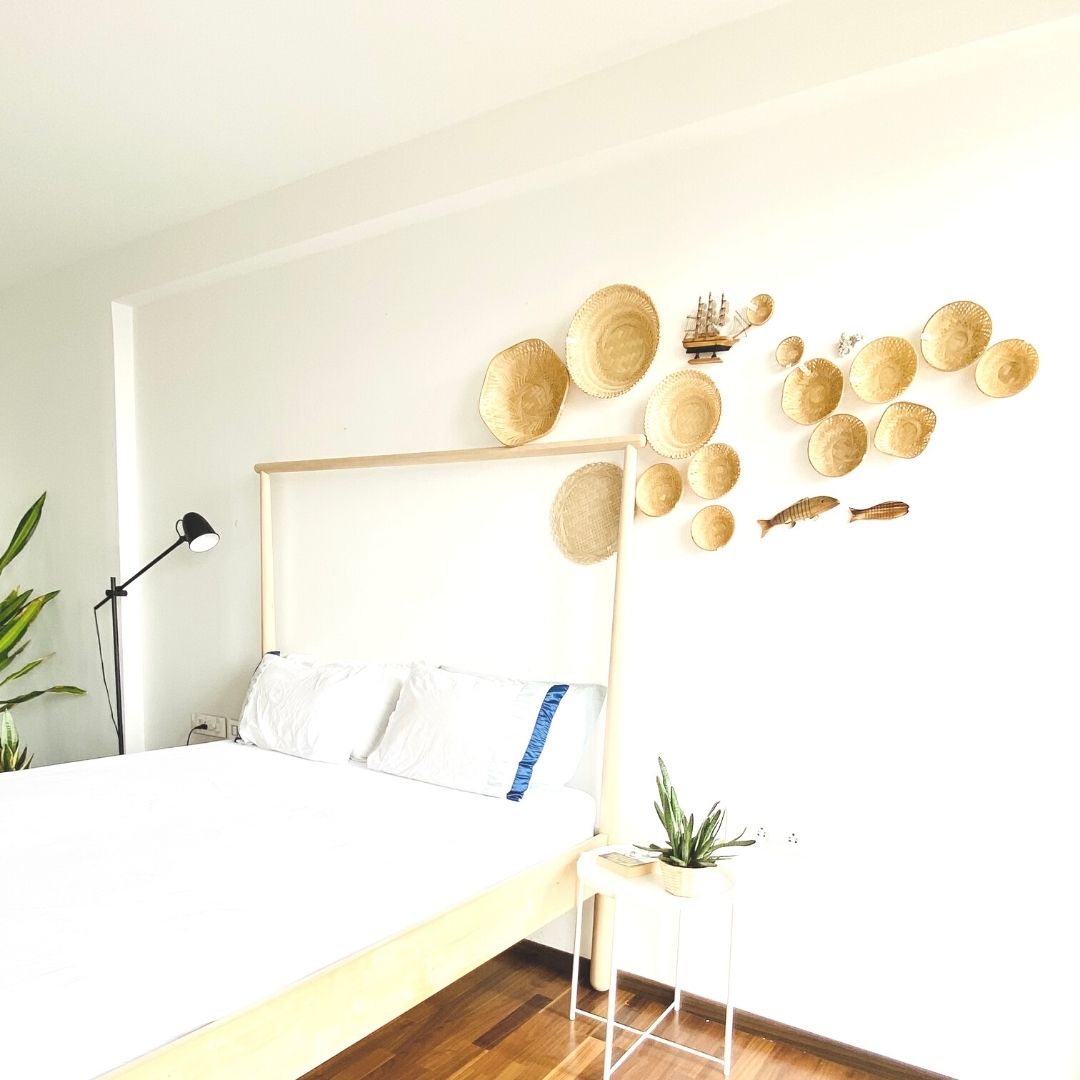 Side view of Sea wall decor arrangement in bedroom set up