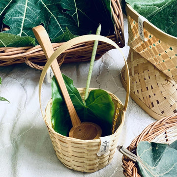 Simple and beautiful pourer for everyday cooking kept inside bucket basket